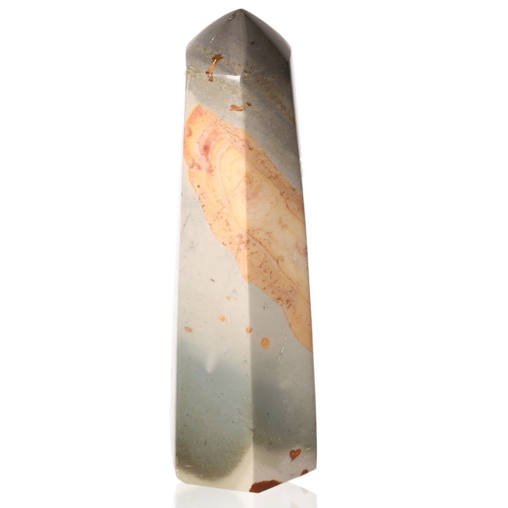 Polychrome Jasper obelisk with vibrant red, orange, and brown bands, known for its grounding and energizing properties.