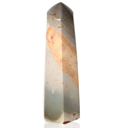 Polychrome Jasper obelisk with vibrant red, orange, and brown bands, known for its grounding and energizing properties.