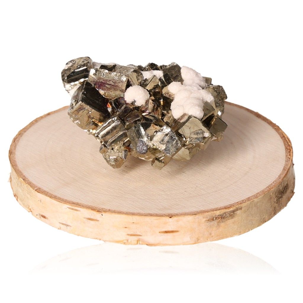 Pyrite druzy stone on wooden slab, inspires new ideas and courage, supports independence and goal achievement