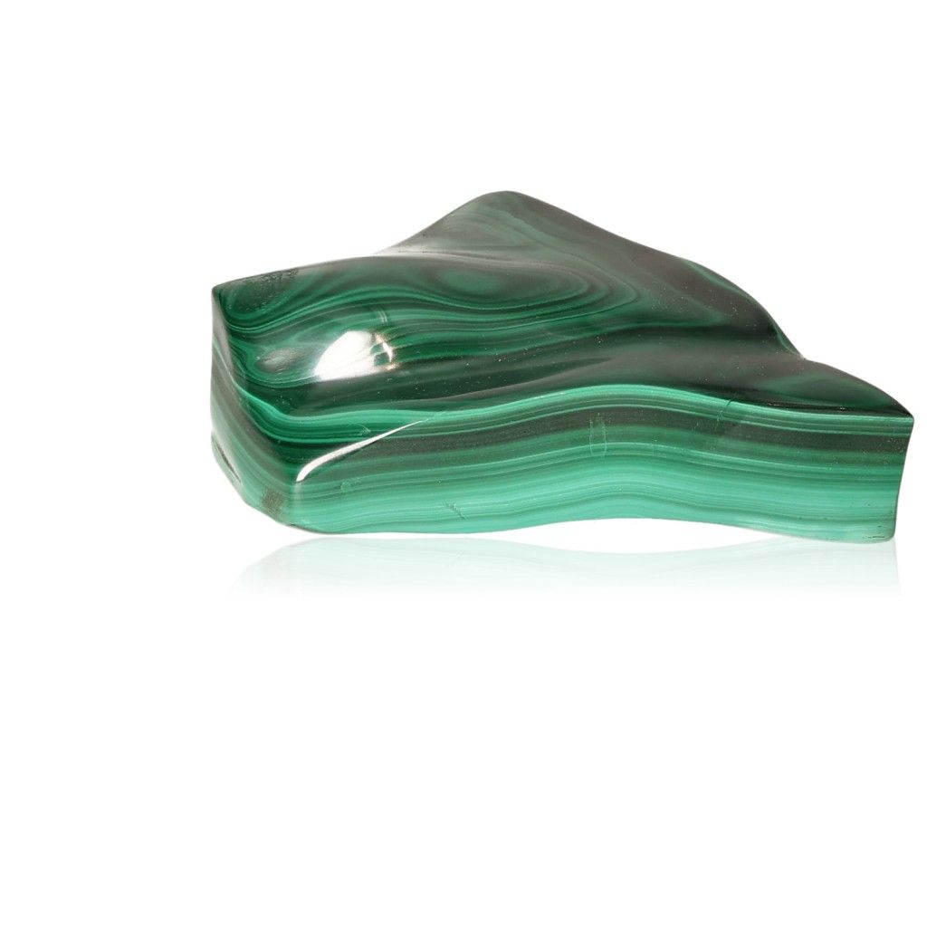 Shiny polished malachite stone with swirling green patterns representing nature's soothing energy and courage.