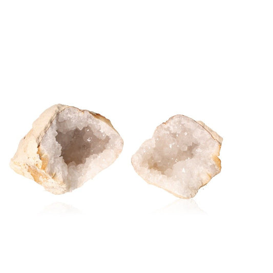 Milky quartz geode cut open, revealing sparkling cloudy white crystals, ideal for energy balance and promoting inner strength.