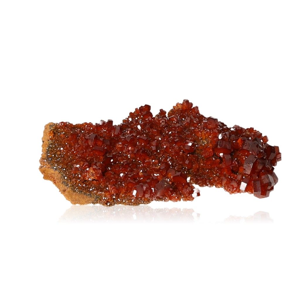 Vanadinite Druze with vibrant reddish-brown hexagonal crystals on a glassy surface, enhancing focus and motivation.