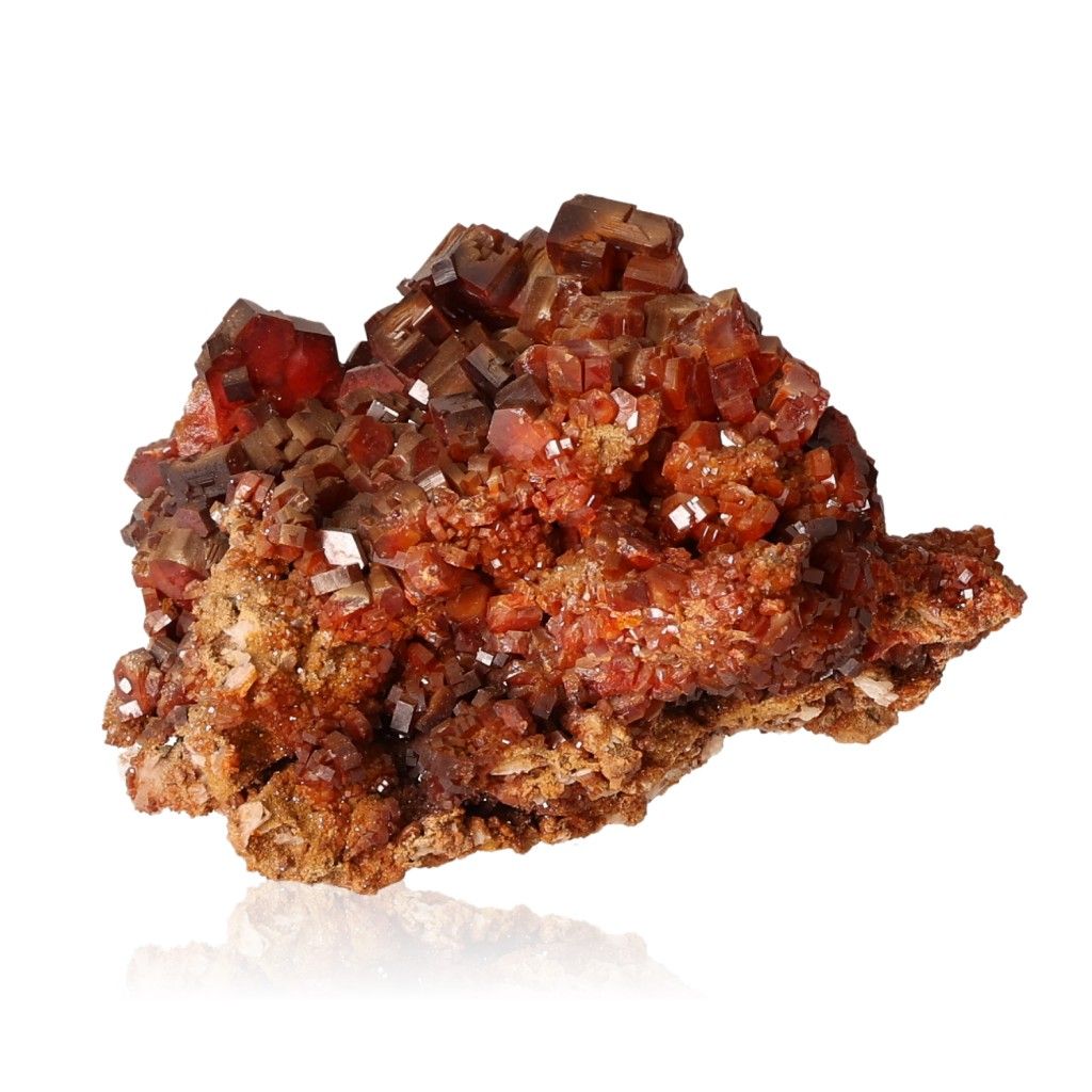 Vanadinite Druze with vibrant red hexagonal crystals and glassy surface, enhancing focus and motivation, visually captivating stone.