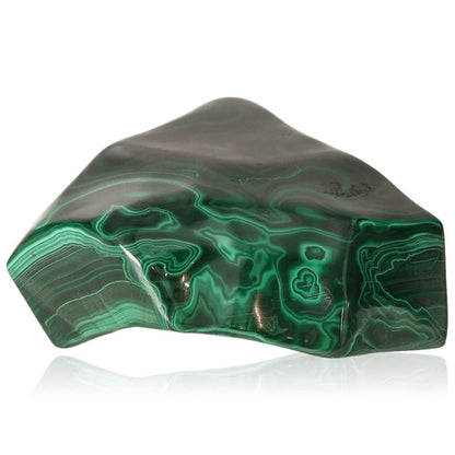 Polished malachite stone with vibrant green patterns, known for its soothing energy and support in finding inner harmony.