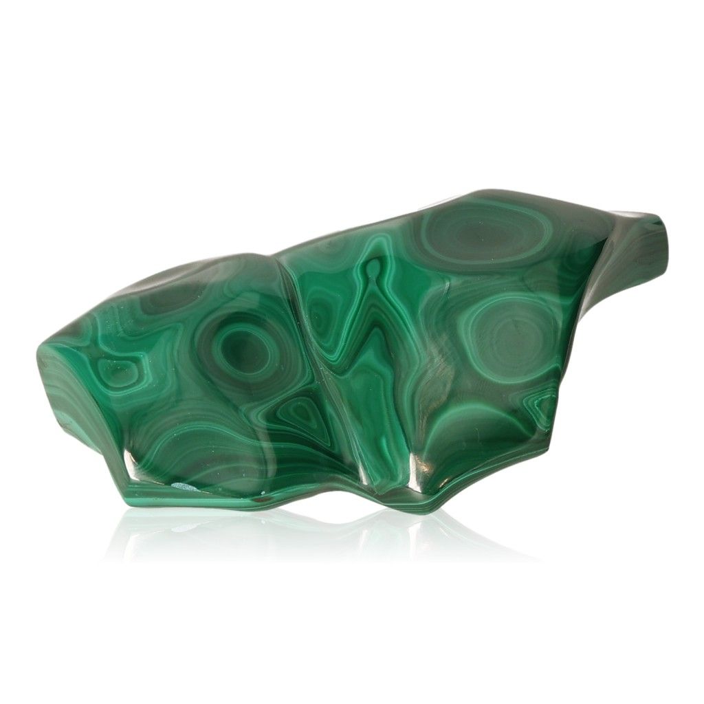 Polished green malachite stone with unique swirling patterns, symbolizing soothing energy and inner harmony.