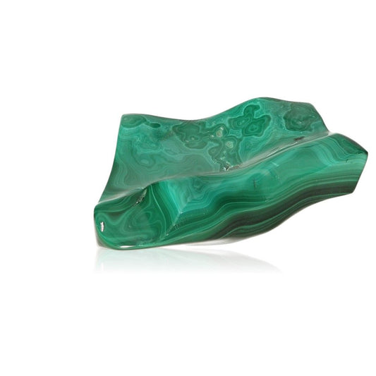 Green malachite stone with natural patterns, symbolizing courage and harmony.