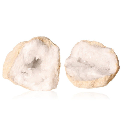 Milky quartz geode split open, revealing sparkling white crystals within rugged earthy shells, promoting tranquility and positive energy.