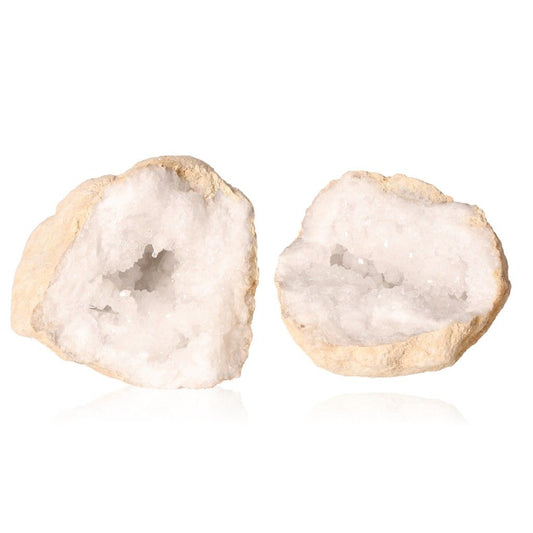 Milky quartz geode split open, revealing sparkling white crystals within rugged earthy shells, promoting tranquility and positive energy.