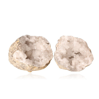 Milky quartz geode split open, showing sparkling cloudy white crystals, known for enhancing tranquility and promoting positive energy.