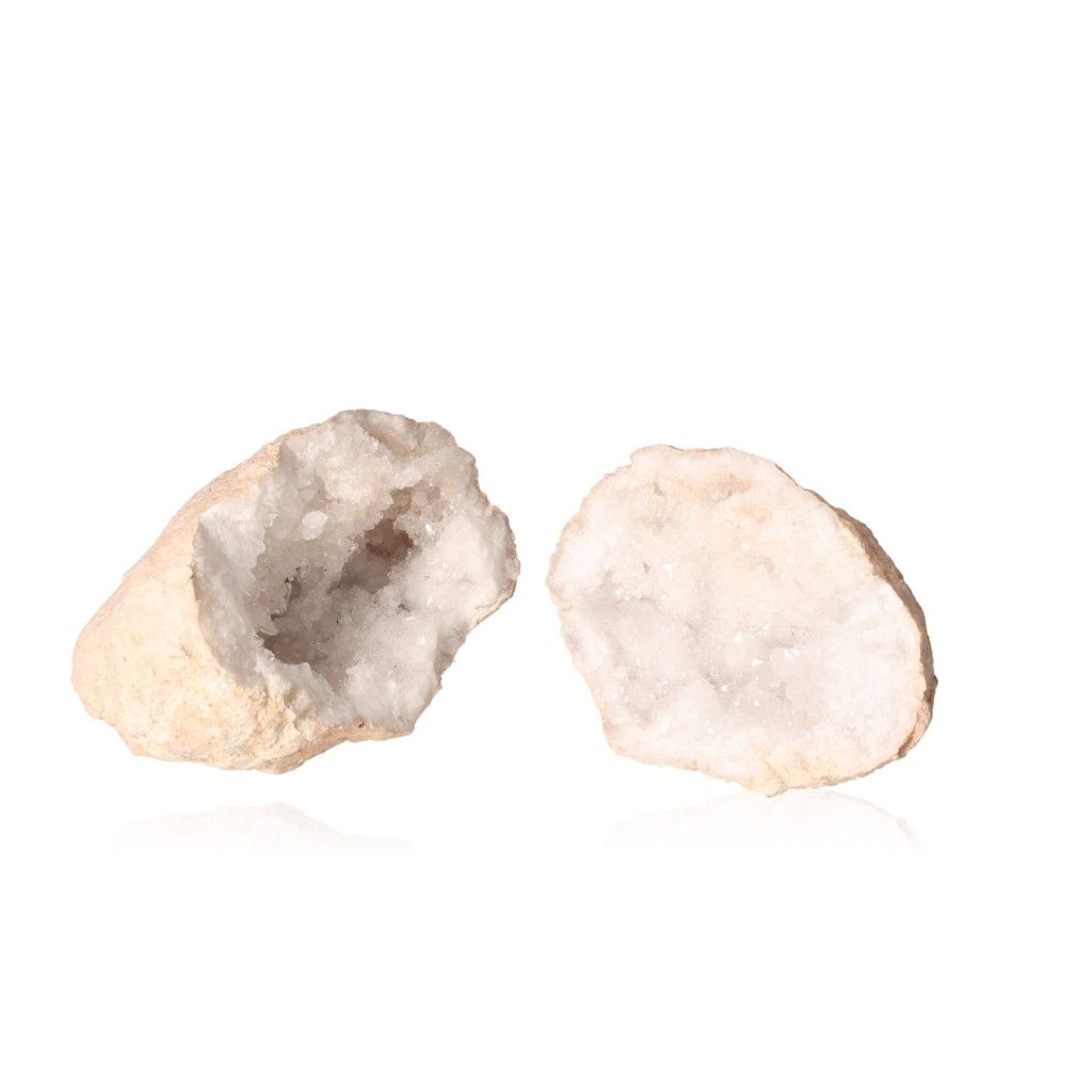 Milky quartz geode split open, revealing sparkling white crystals inside, perfect for energy cleansing and promoting tranquility.