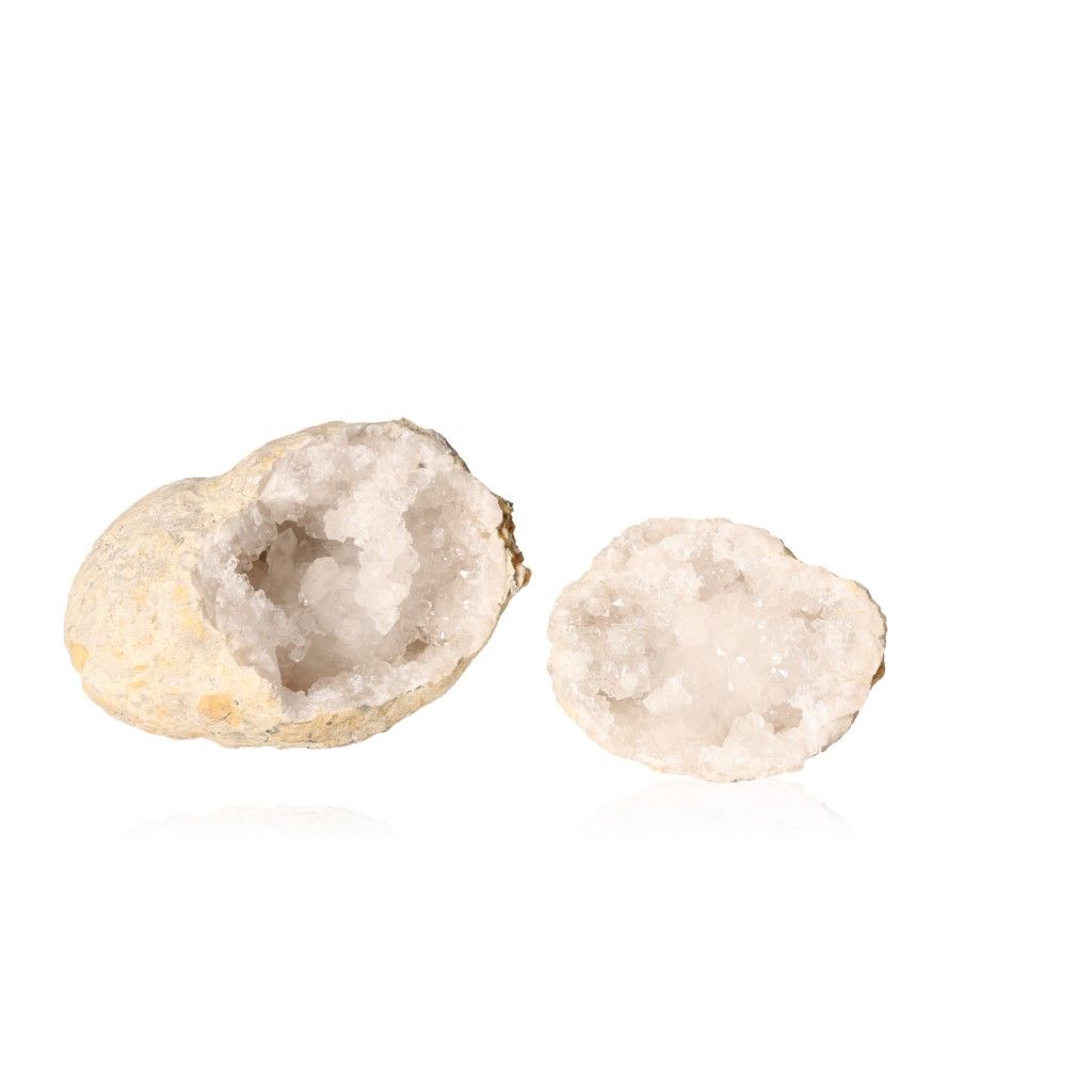 Quartz geode with cloudy white crystals and rugged shell, known for purifying energy and enhancing tranquility.