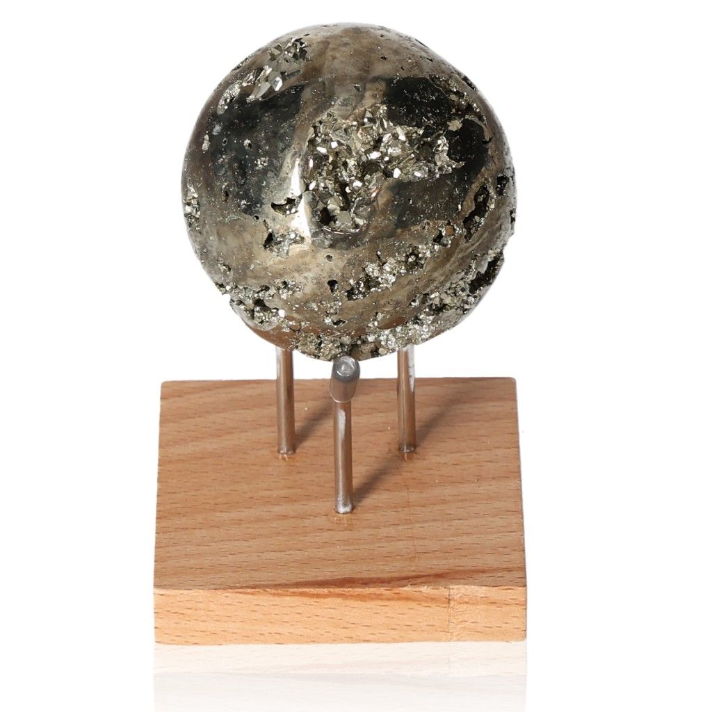 Pyrite sphere on wooden stand, inspiring new ideas and supporting independence.