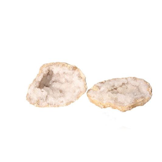 Milky quartz geode with rugged shell and sparkling white crystals, enhancing energy balance and promoting tranquility.