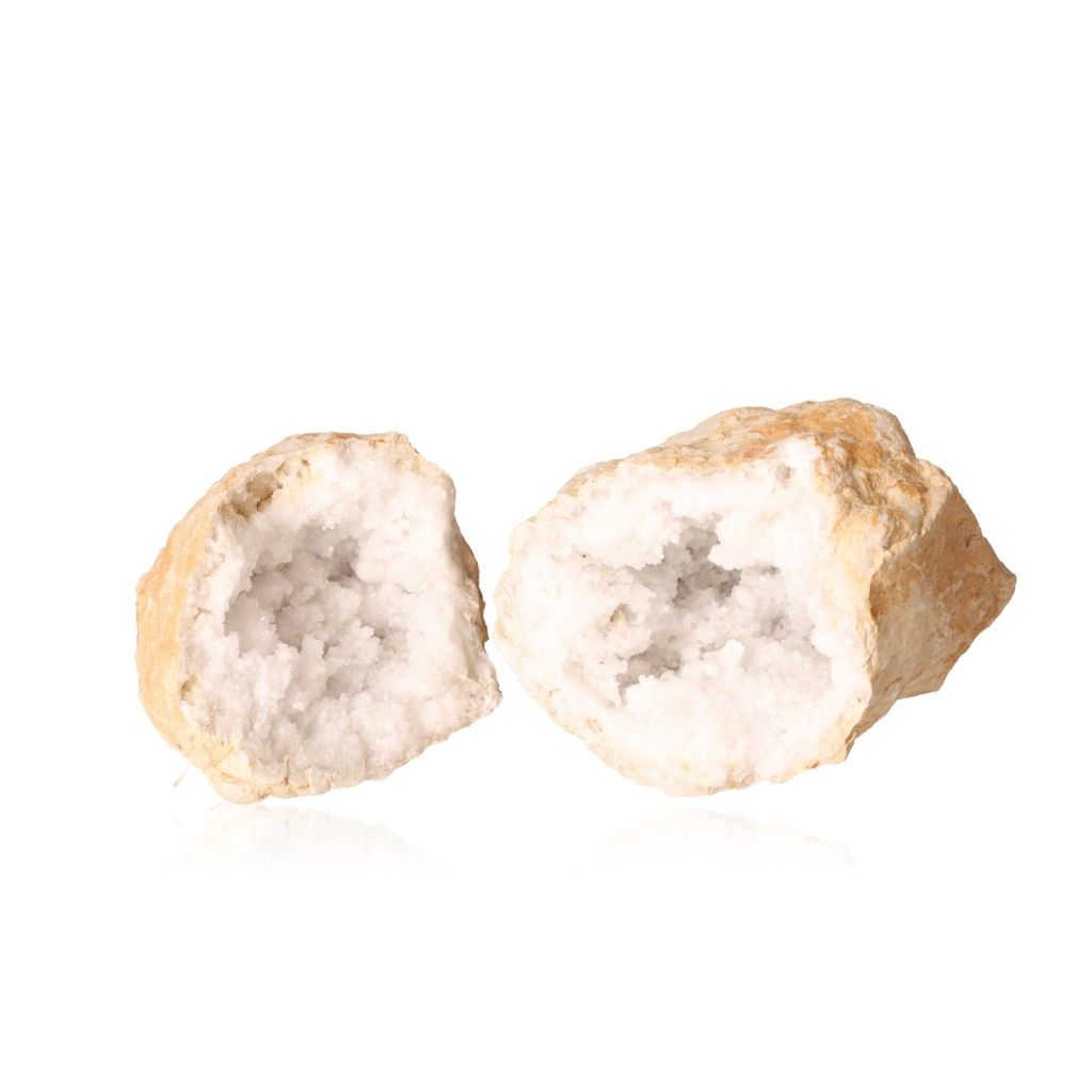 Milky quartz geode split open, revealing sparkling cloudy white crystals, known for purifying energy and enhancing tranquility.