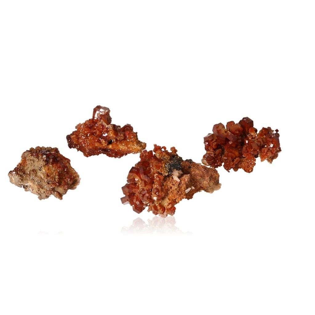 Vanadinite small druzes with vibrant hexagonal crystals in reddish-brown colors, promoting focus and personal transformation.