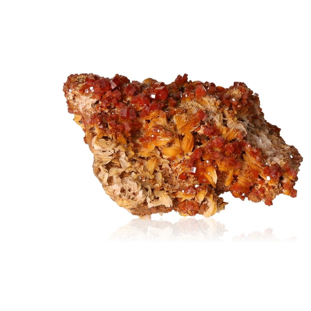 Vanadinite druzy with vibrant reddish-brown and orange hexagonal crystals showcasing a captivating glassy surface.