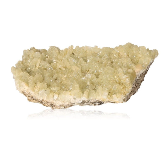 Prehnite Druze gemstone with pale green crystals, known for its calming properties and spiritual growth enhancement.