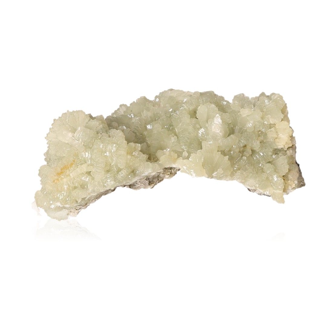 Prehnite Druze gemstone with pale green crystals, promoting inner peace and spiritual growth.