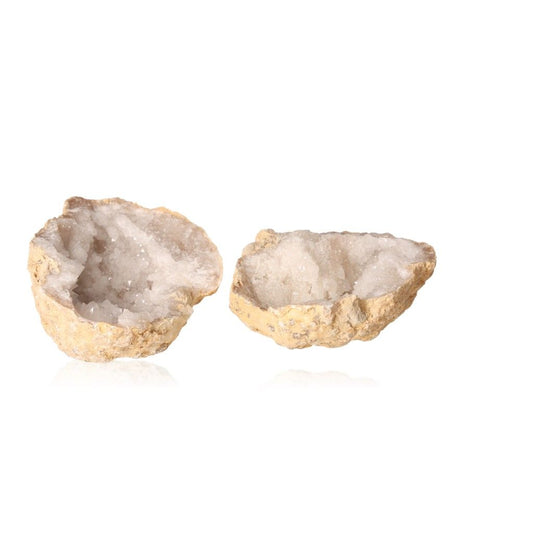 Quartz geode with rugged shell and cloudy white crystals for enhancing energy, focus, and tranquility.