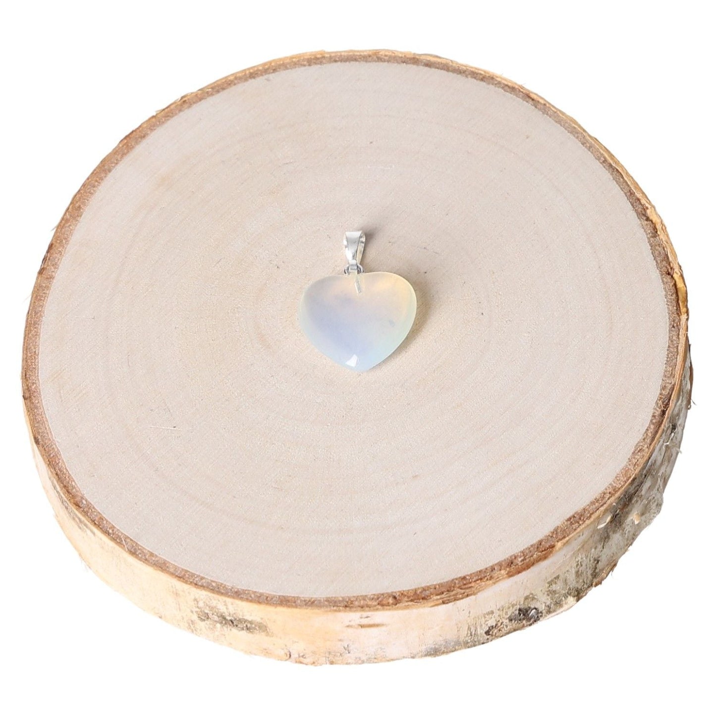 Opallite heart pendant 15mm displayed on a wooden surface.