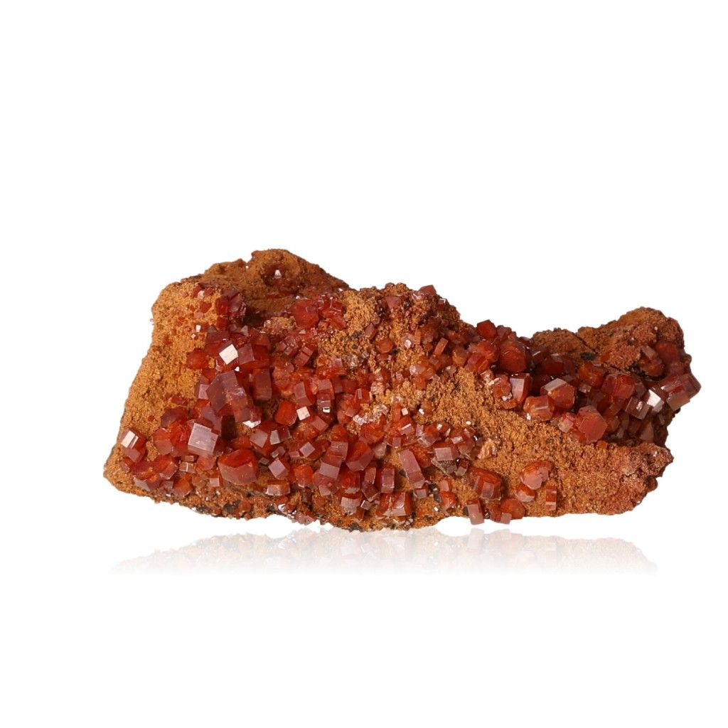 Vanadinite Druze with reddish-orange hexagonal crystals on a natural rock base, enhancing focus and motivation.