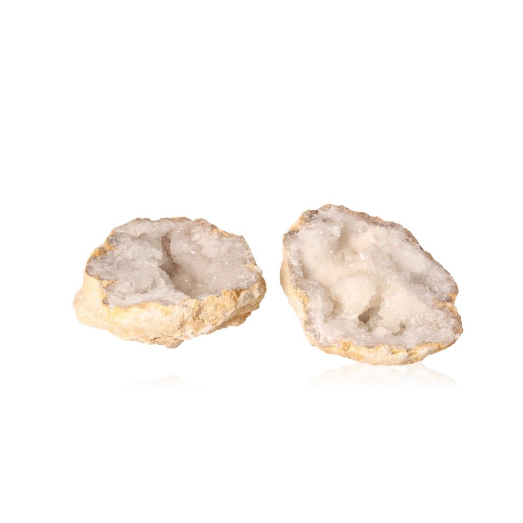 Milky quartz geode with rugged shell showcasing sparkling white crystals, ideal for tranquility and energy balance.