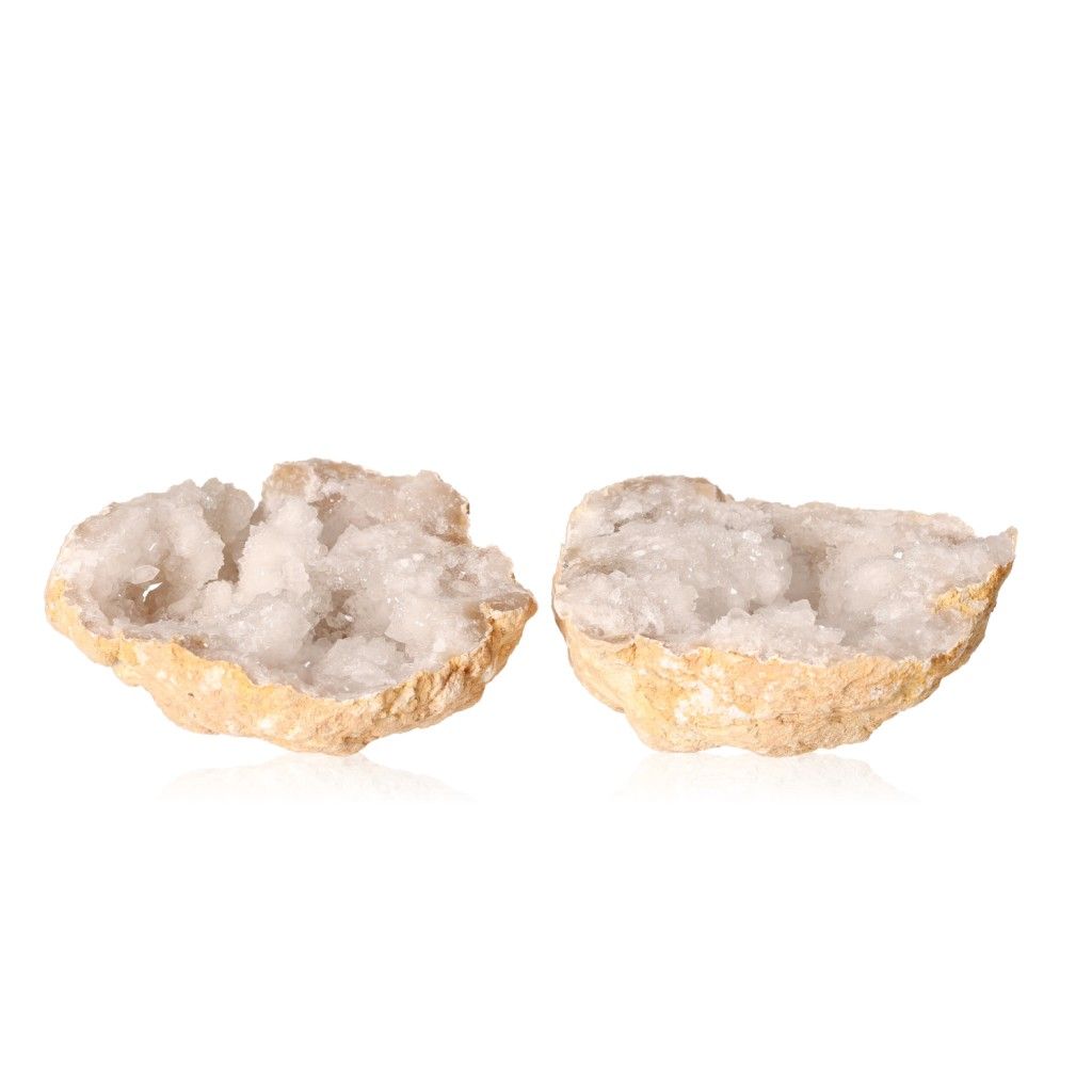 Milky quartz geode with rugged shell revealing sparkling cloudy white crystals, enhancing tranquility and energy balance.