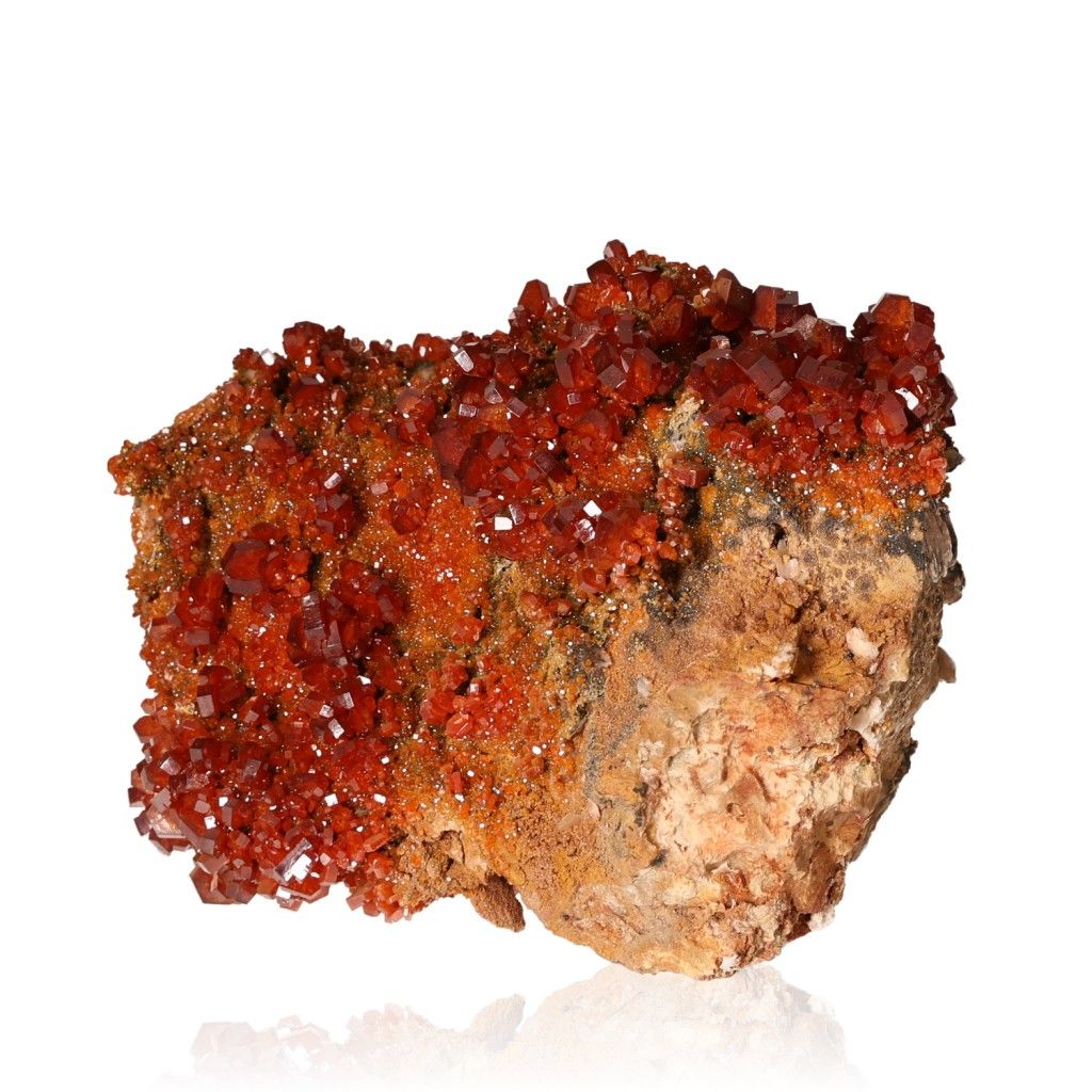 Reddish-brown Vanadinite Druze with vibrant hexagonal crystals and glassy surface, enhancing focus and motivation.