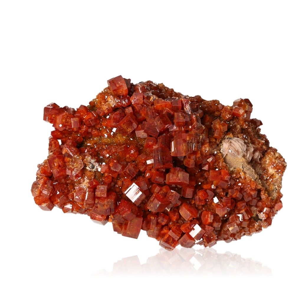 Vanadinite crystal cluster with vibrant reddish-brown hexagonal shapes and glassy surface, enhancing focus and motivation.