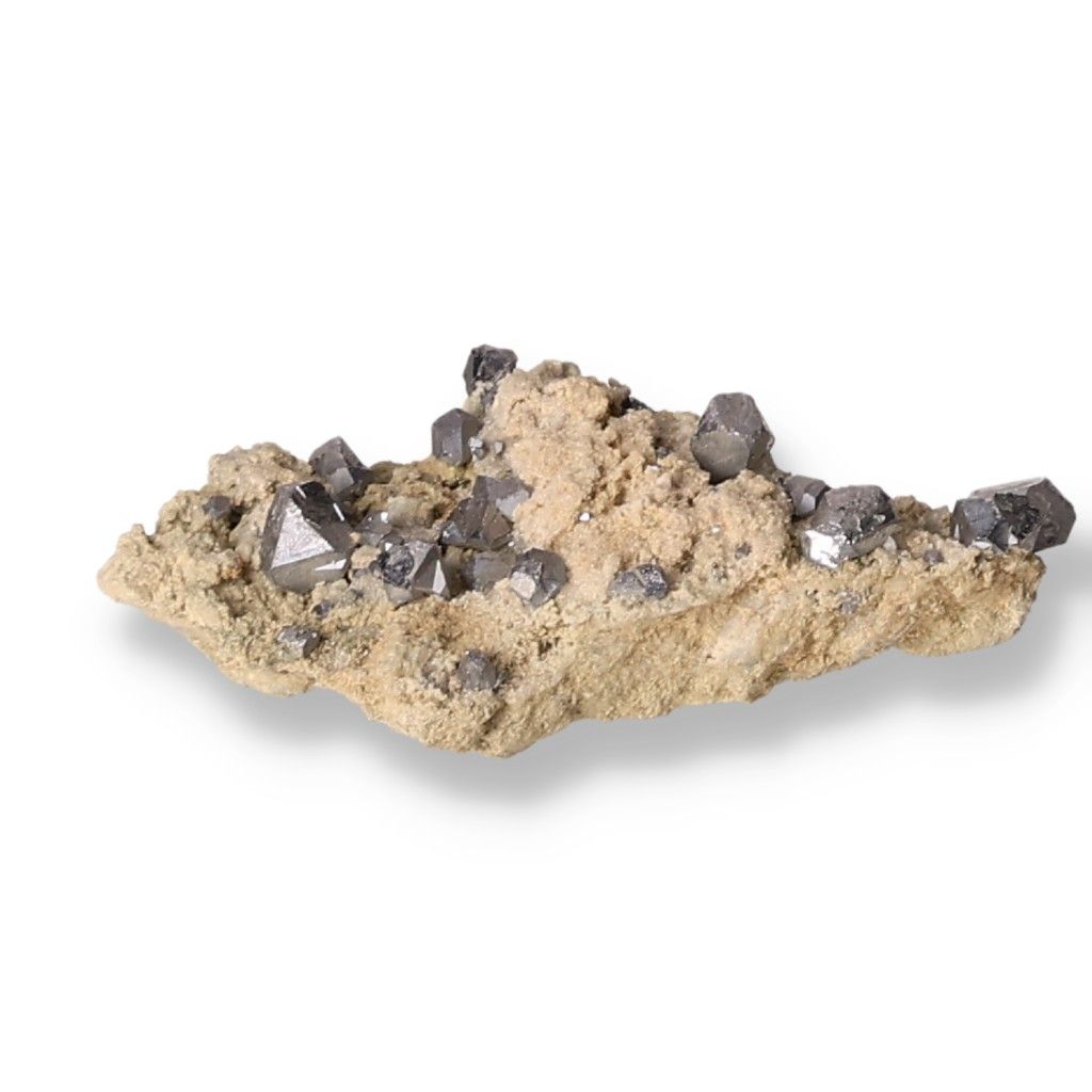 Raw galena stone featuring shiny metallic crystals on a sandy matrix, known for its transformative and grounding properties in spiritual practices.