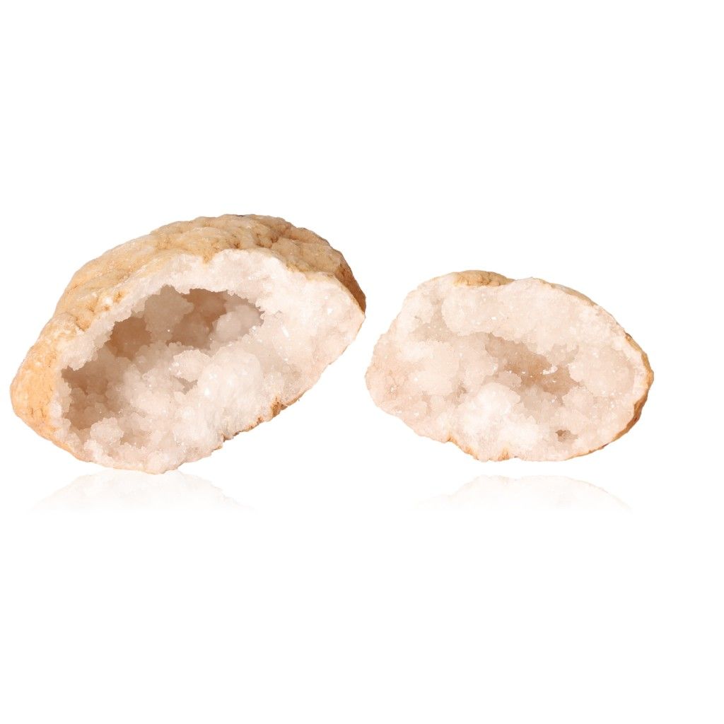 Milky quartz geodes with rugged shells and sparkling cloudy white crystals, enhancing tranquility, focus, and positive energy.