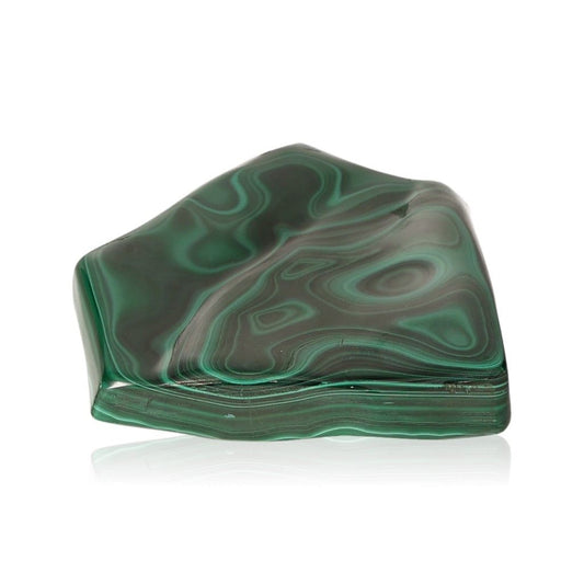 Polished malachite gemstone with rich green swirls offering soothing energy for courage and optimism.