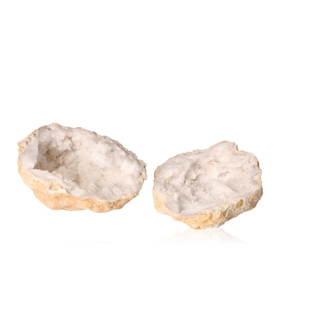 Milky quartz geode with sparkling white crystals, showcasing its rugged outer shell and tranquil energy-enhancing properties.