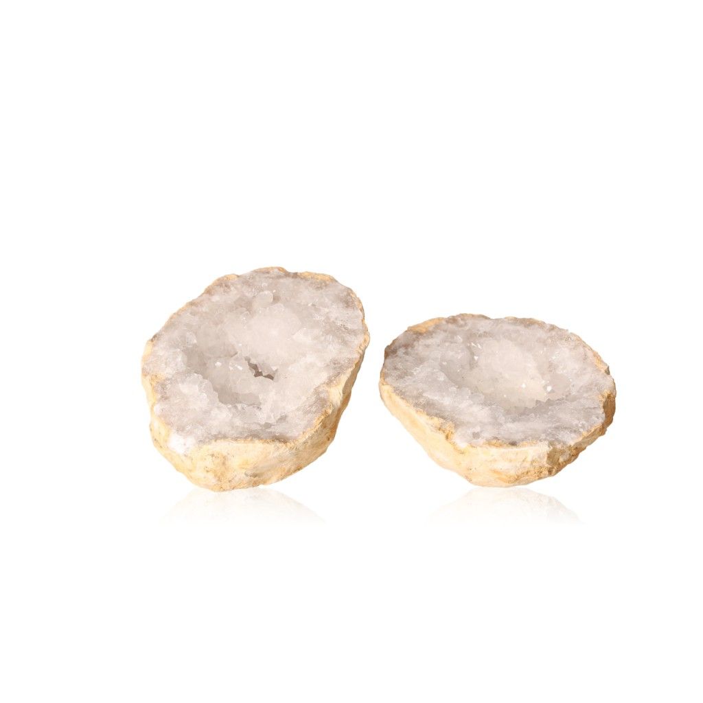 Milky quartz geode with rugged shell and sparkling white crystals, ideal for energy cleansing and enhancing tranquility.