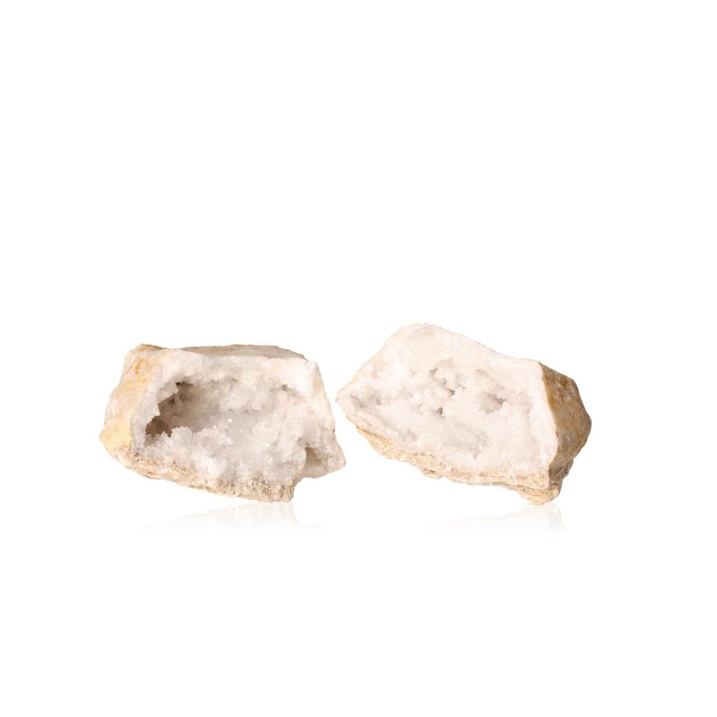 Quartz geode cut open showing sparkling cloudy white crystals, promoting tranquility, focus, and positive energy vibes.