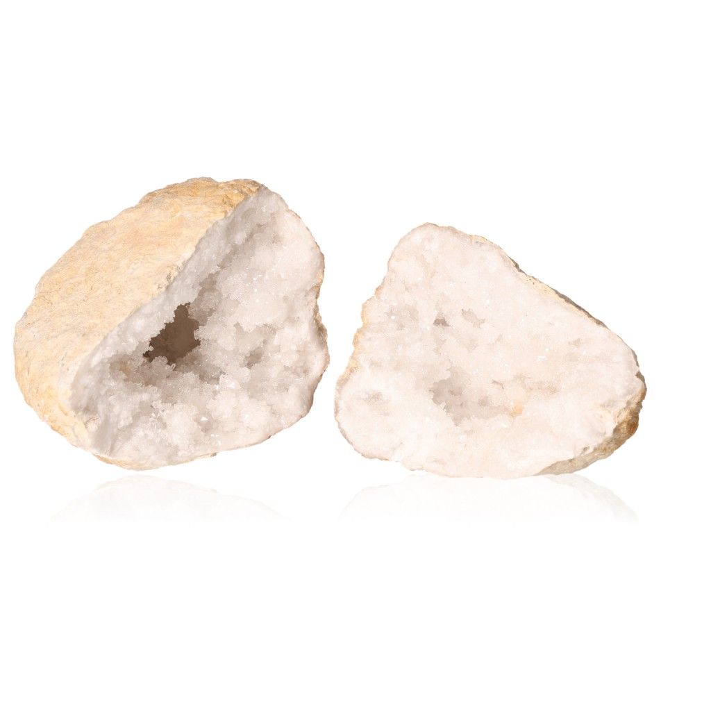 Milky quartz geode split open, displaying cloudy white crystals, known for purifying energy and enhancing tranquility.