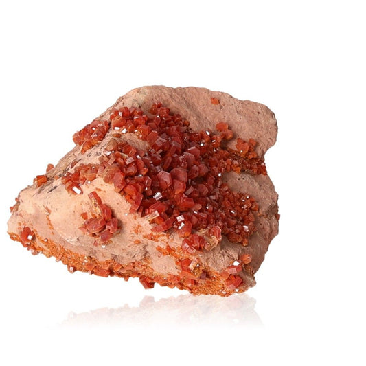 Vanadinite druzy cluster, an energizing stone for focus, motivation, and personal transformation, boosting drive and determination.