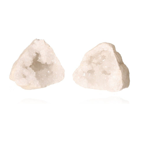 Milky quartz geode with cloudy white crystals exposed, enhancing tranquility and purifying spaces.