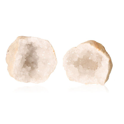 Milky quartz geode with rugged outer shell and sparkling white crystals, ideal for purifying energy and enhancing tranquility.