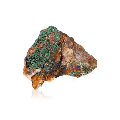 Raw malachite stone with vibrant green patterns on a white background.