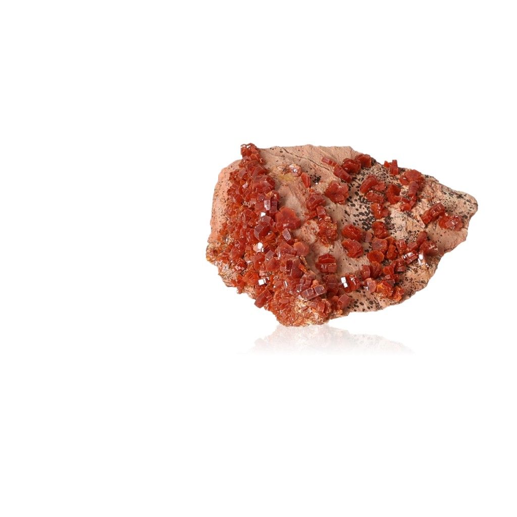 Vanadinite druze stone for focus and motivation on a white background.