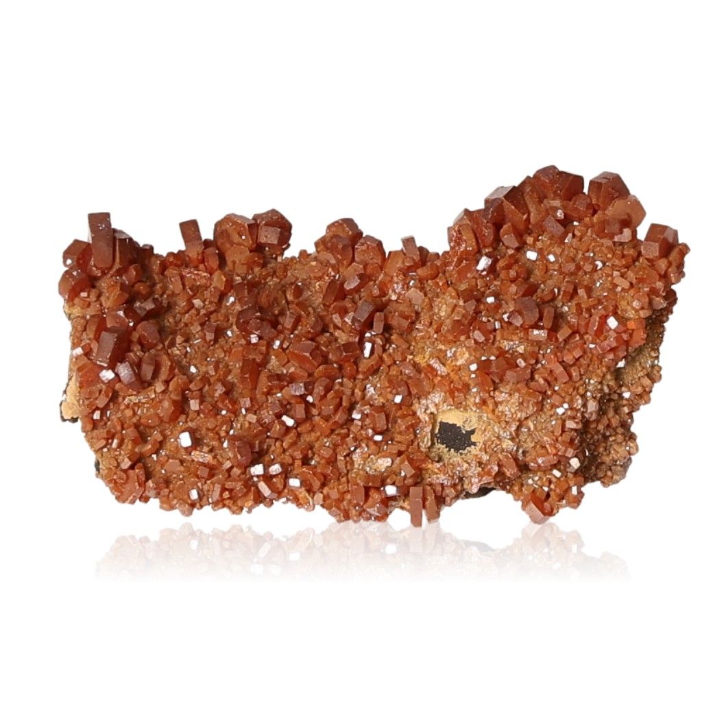 Vanadinite Druze with vibrant hexagonal reddish-brown crystals on a reflective surface, enhancing focus and personal transformation.