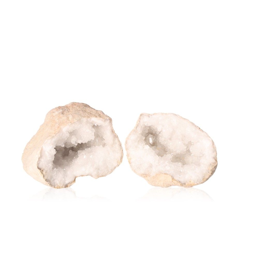 Milky quartz geode with sparkling white crystals enhances energy, clarity, and tranquility. Perfect for space cleansing and focus.