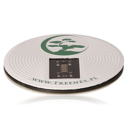 Absorber Treenes White 8 cm electromagnetic shield with tree logo and website URL displayed.