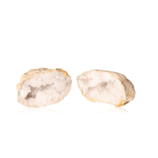 Milky quartz geodes with sparkling white crystals for energy cleansing and tranquility.