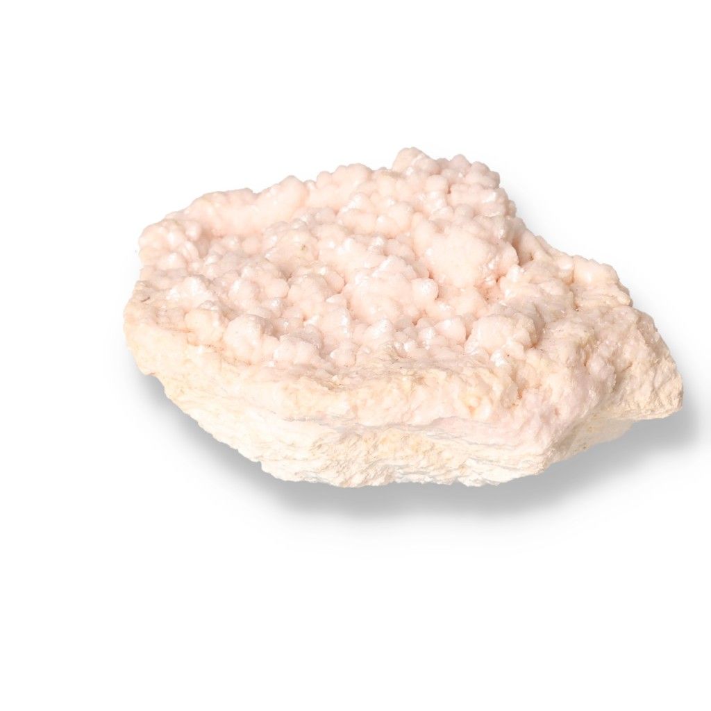 Mangano Calcite stone with soft pink hues, known as the Stone of Love for emotional healing and cultivating compassion.