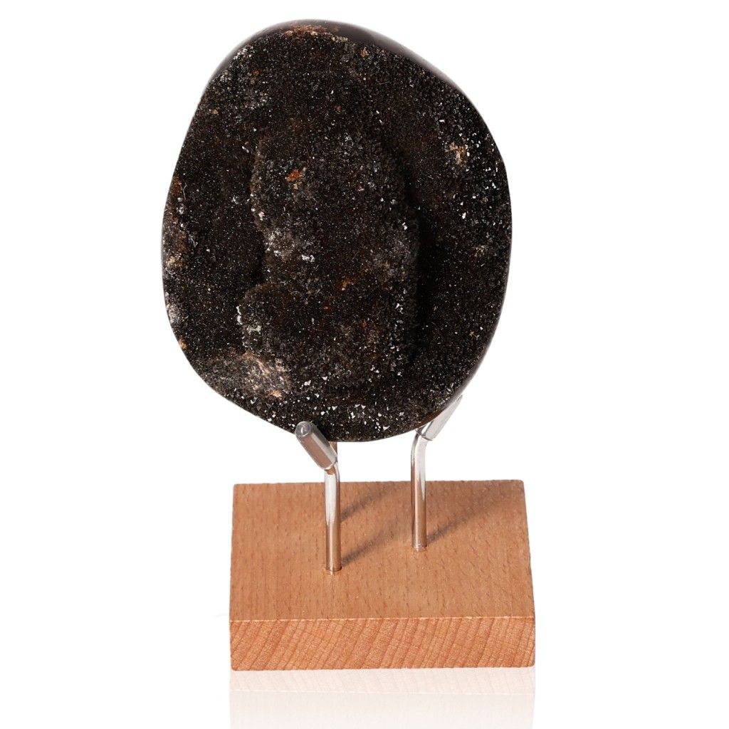 Septarian Dragon Stone on wooden stand, showcasing its unique texture and multidimensional properties.