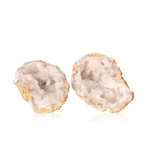 Quartz geode with milky white crystals and rugged shell, ideal for enhancing tranquility, clarity, and promoting positive energy.