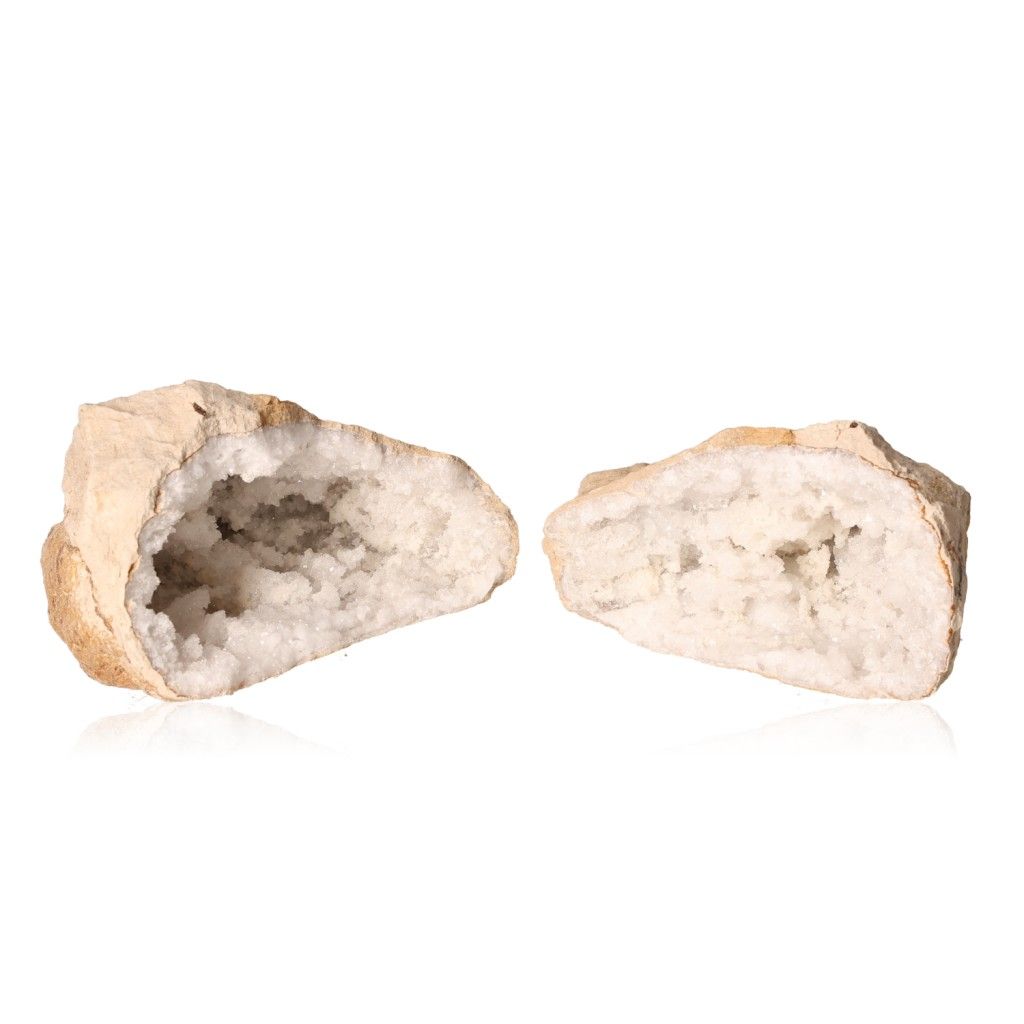 Milky quartz geode with rugged exterior and sparkling white crystals, known for purifying energy and enhancing tranquility and clarity.