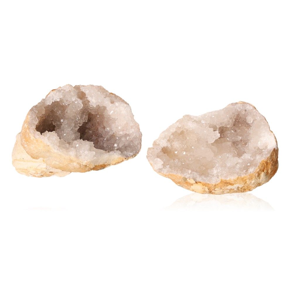 Milky quartz geode with sparkling white crystals and rugged shell, promoting tranquility and cleansing energy.